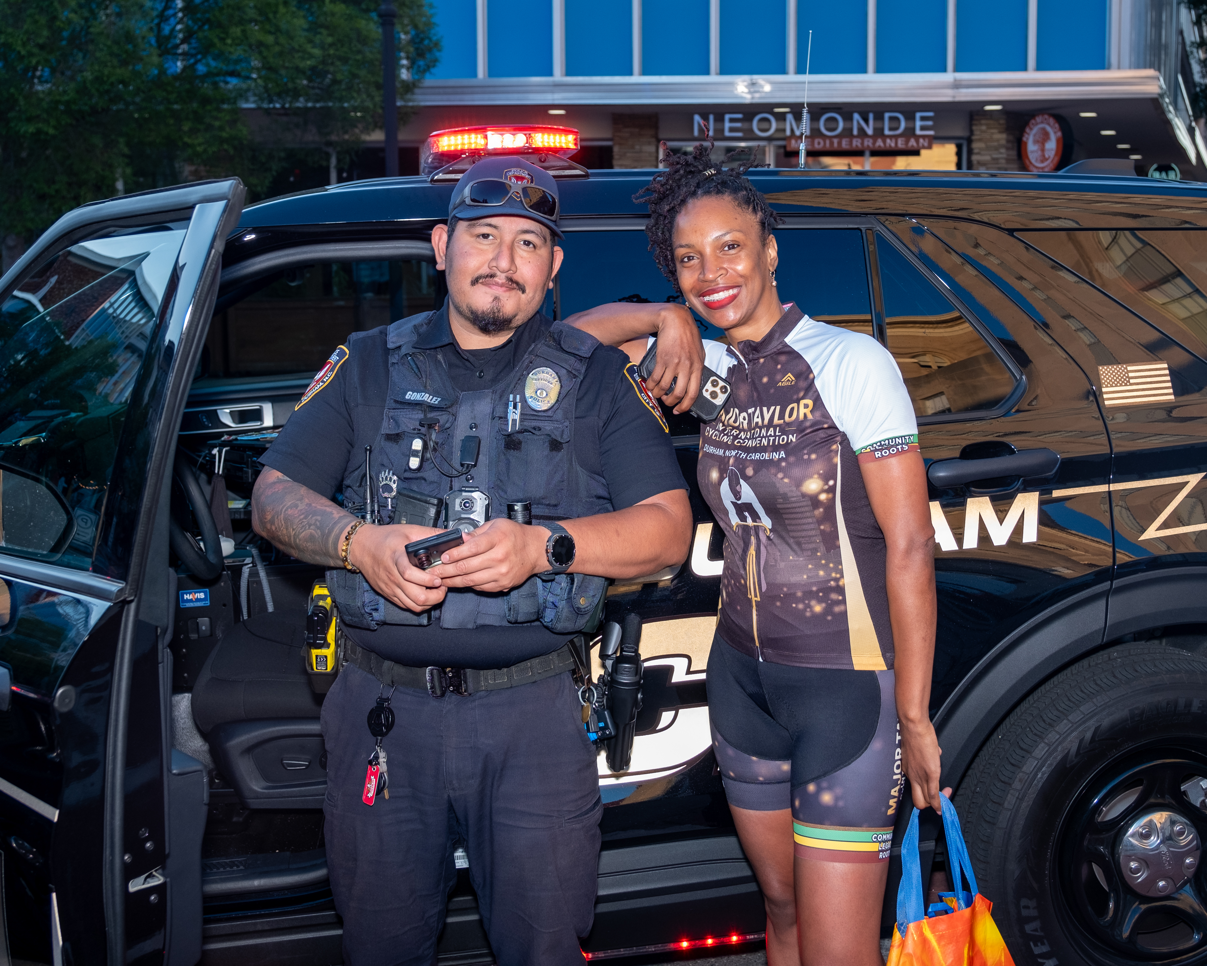 MTICA 2026 Convention organizer with Durham Police Department officer at the CCB Plaza event space in downtown Durham NC