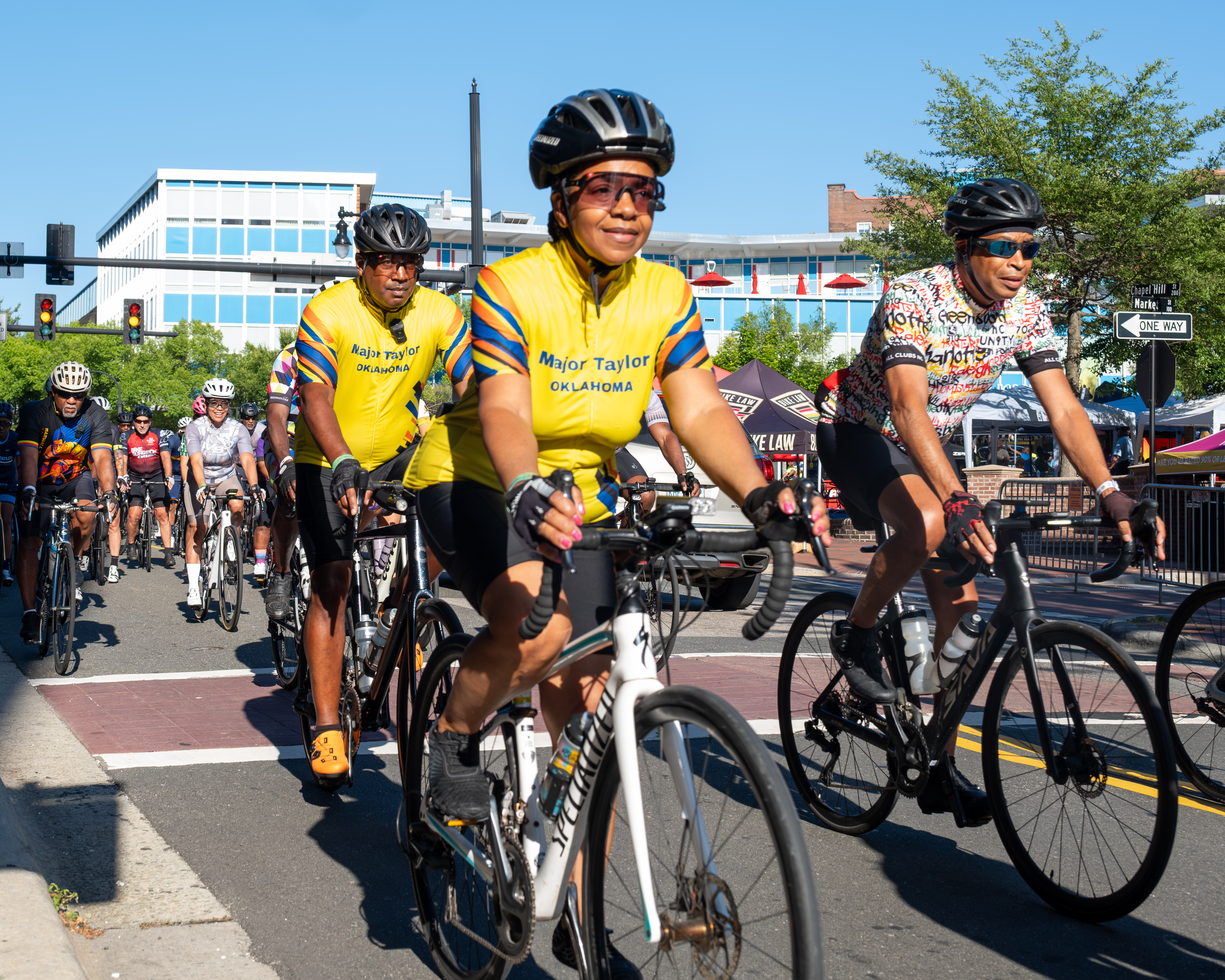 Major Taylor Oklahoma cycling club riders rolling through downtown Durham streets during the MTICA 2026 Convention Saturday ride