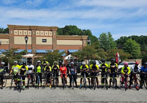 Major Taylor Cycling Club members lined up with their bikes at a ride start in North Carolina